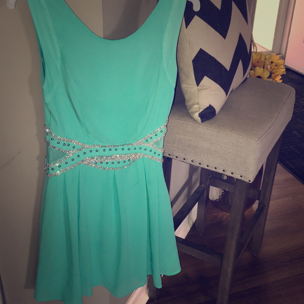 Size 7 baby blue dress with rhinestone belt.